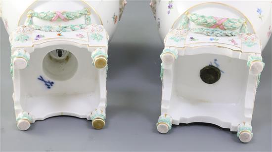 A pair of Meissen pot pourri vases and covers, late 19th century, height 32cm, some restoration